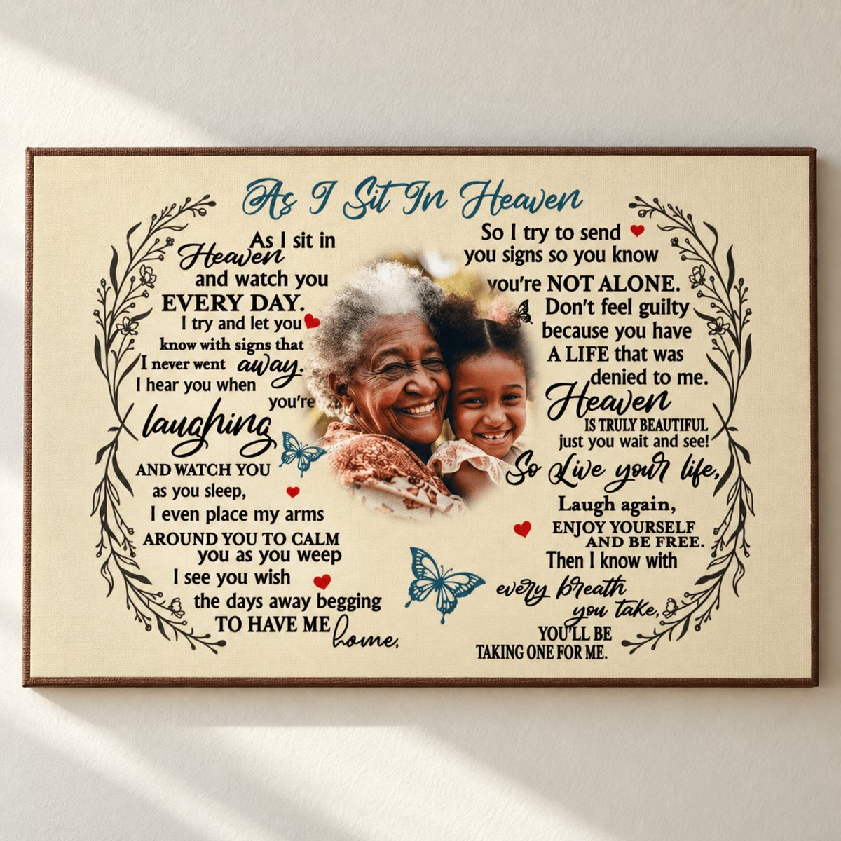 Close-up detail of custom memorial canvas print texture showing poem lettering and butterfly design