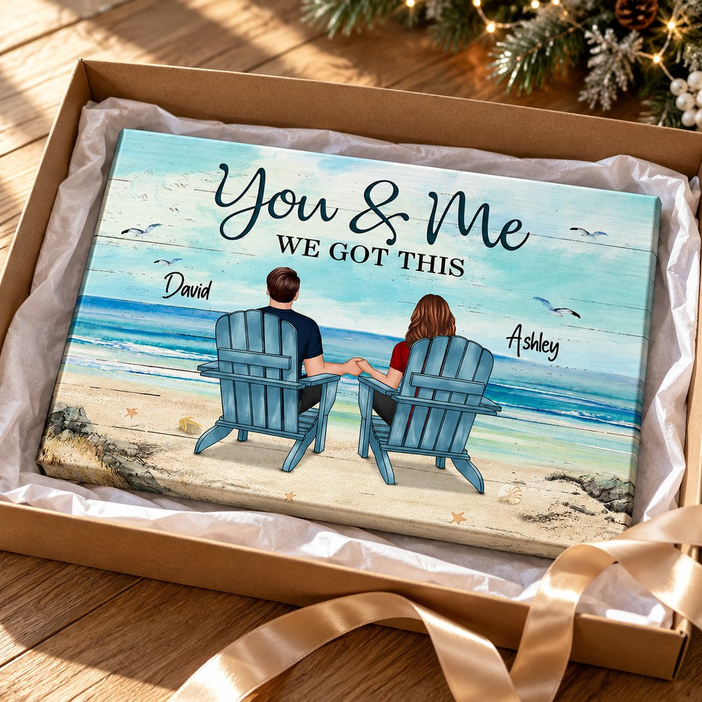 Personalized couple beach canvas print presented in an open gift box with tissue paper and ribbon