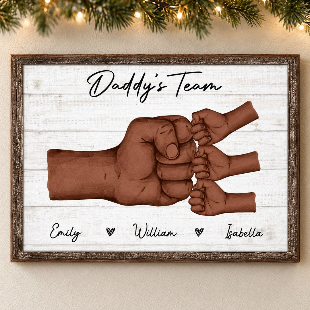 Personalized Daddy's Team fist bump canvas wall art hanging on wall with holiday garland