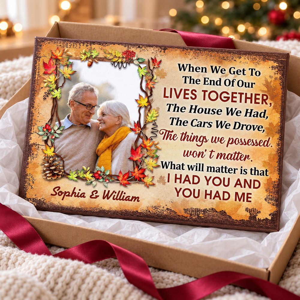 Personalized anniversary canvas art presented in an open gift box with ribbon