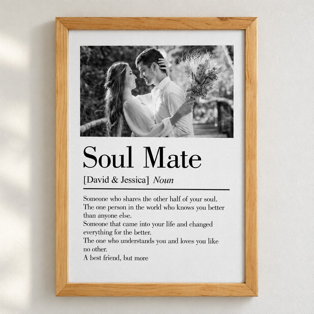 Close-up detail of the custom Soul Mate canvas print texture, typography, and natural wood frame corner