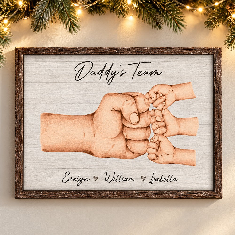 Daddy's Team personalized fist bump framed canvas on wall with holiday pine garland