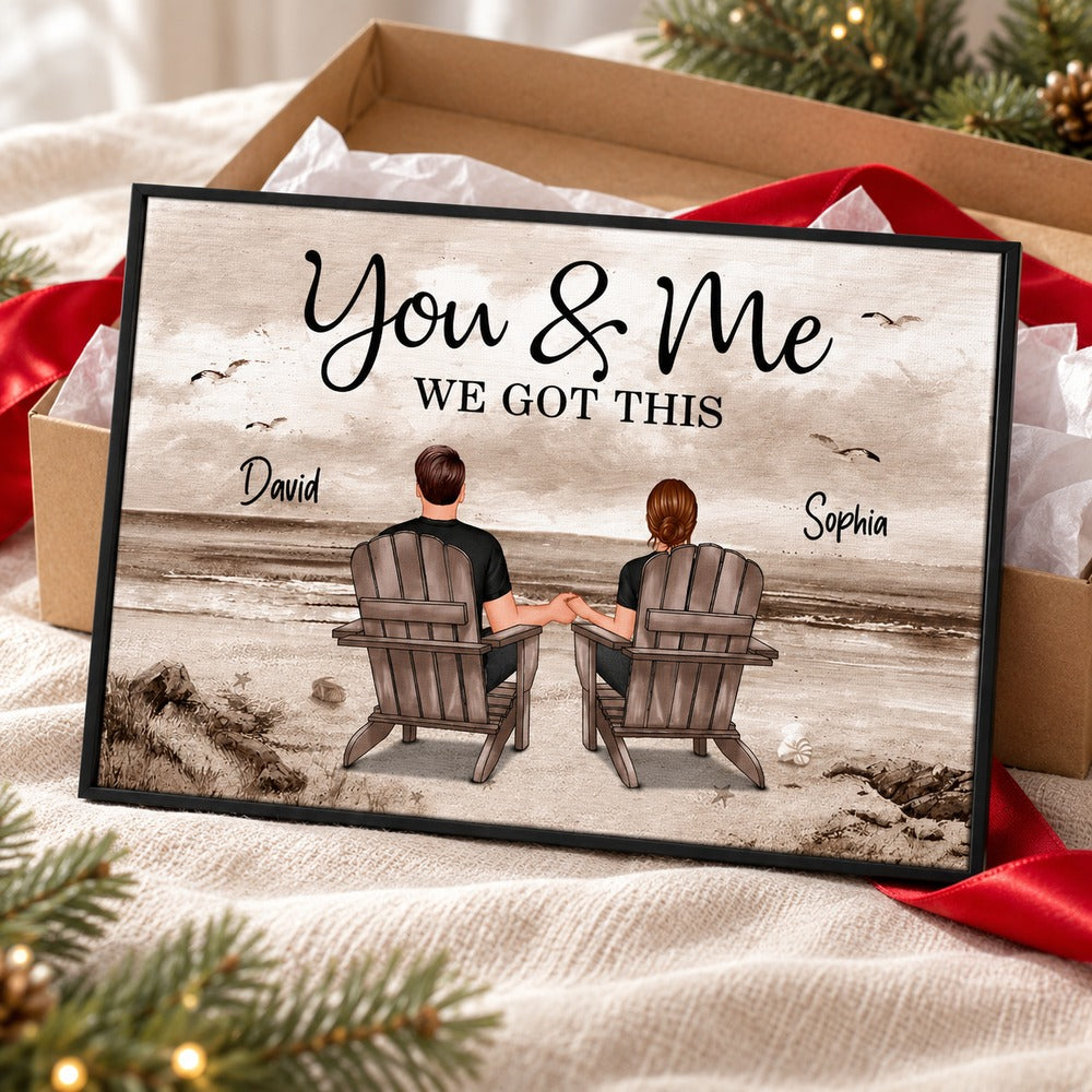 Personalized couple beach canvas print next to gift box with red ribbon and tissue paper