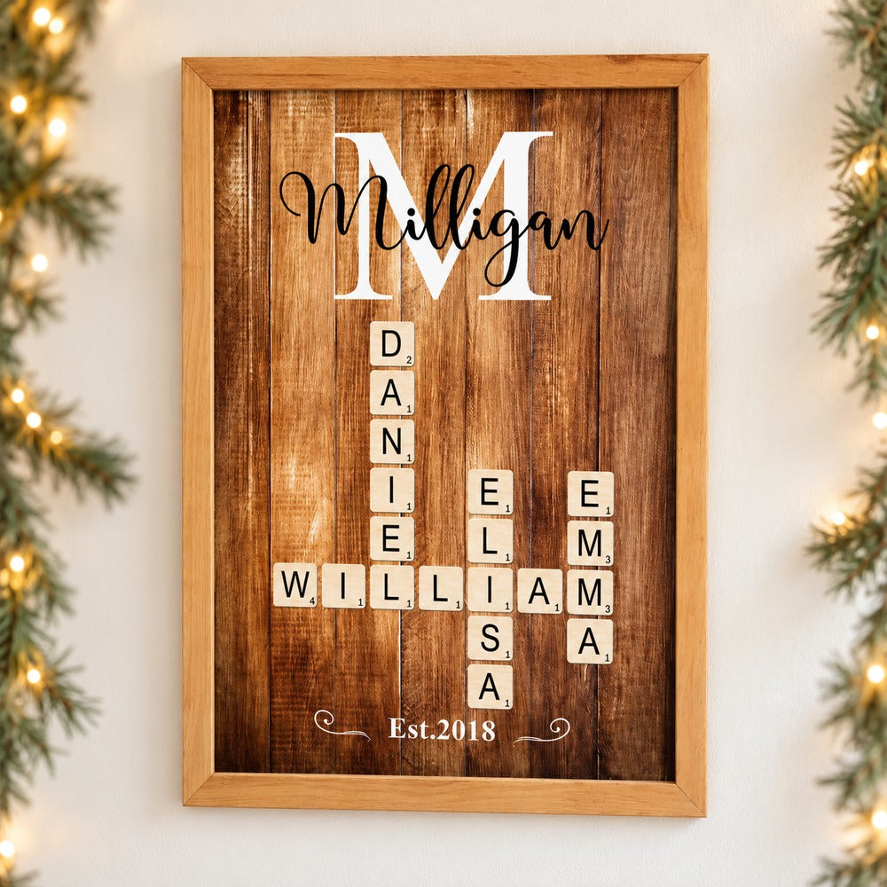 Family Name Crossword Puzzle Art framed canvas hanging on a wall with Christmas garland