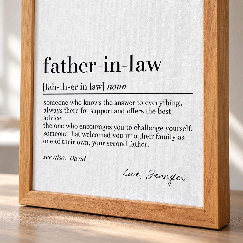 Close up detail of father in law definition print typography and wood frame