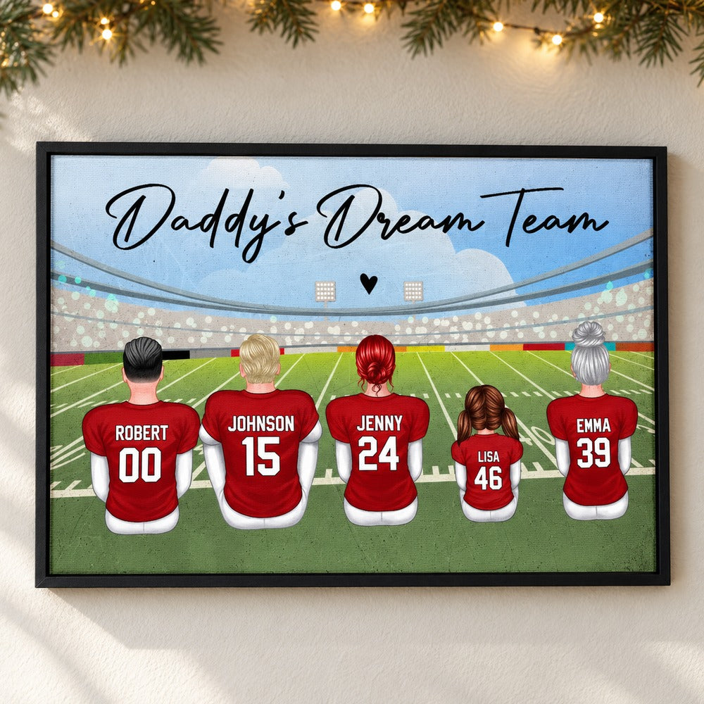 Personalized Football Dad Dream Team canvas on wall with holiday garland and lights