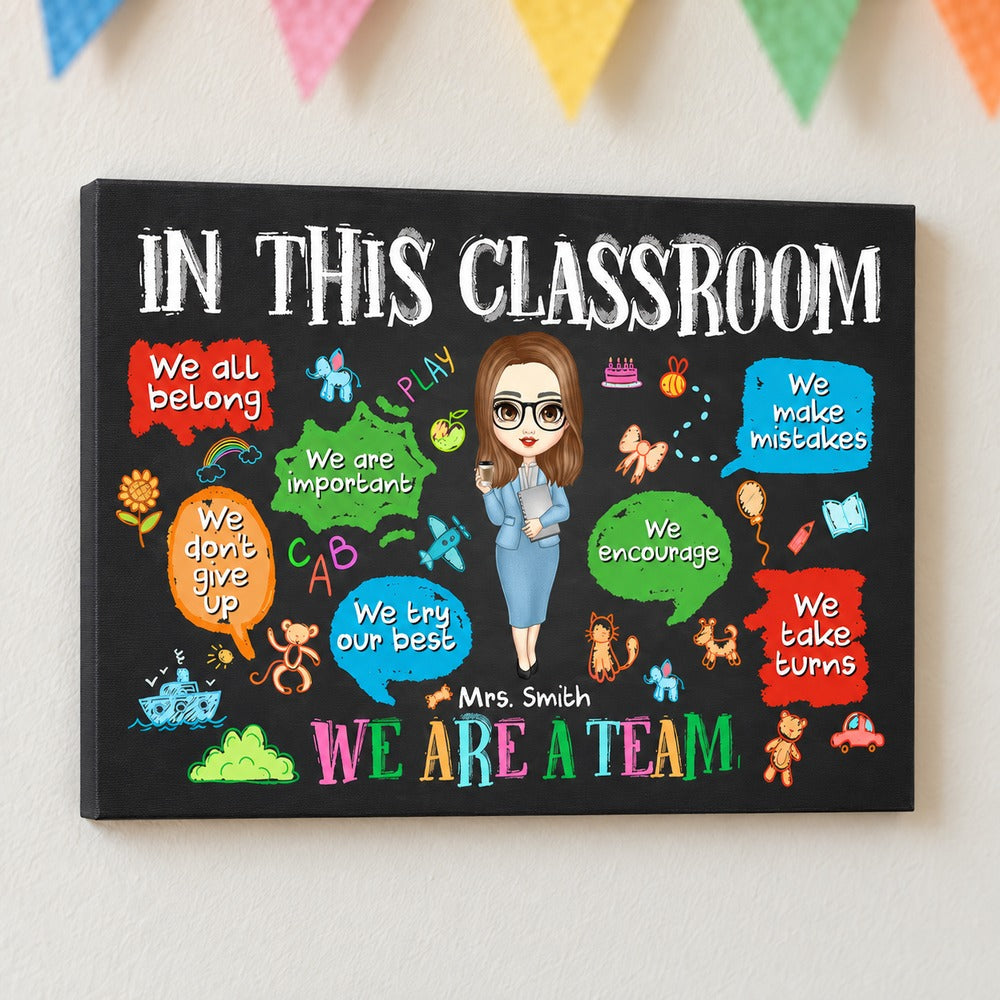 Personalized In This Classroom We Are A Team teacher canvas hanging on a bright classroom wall