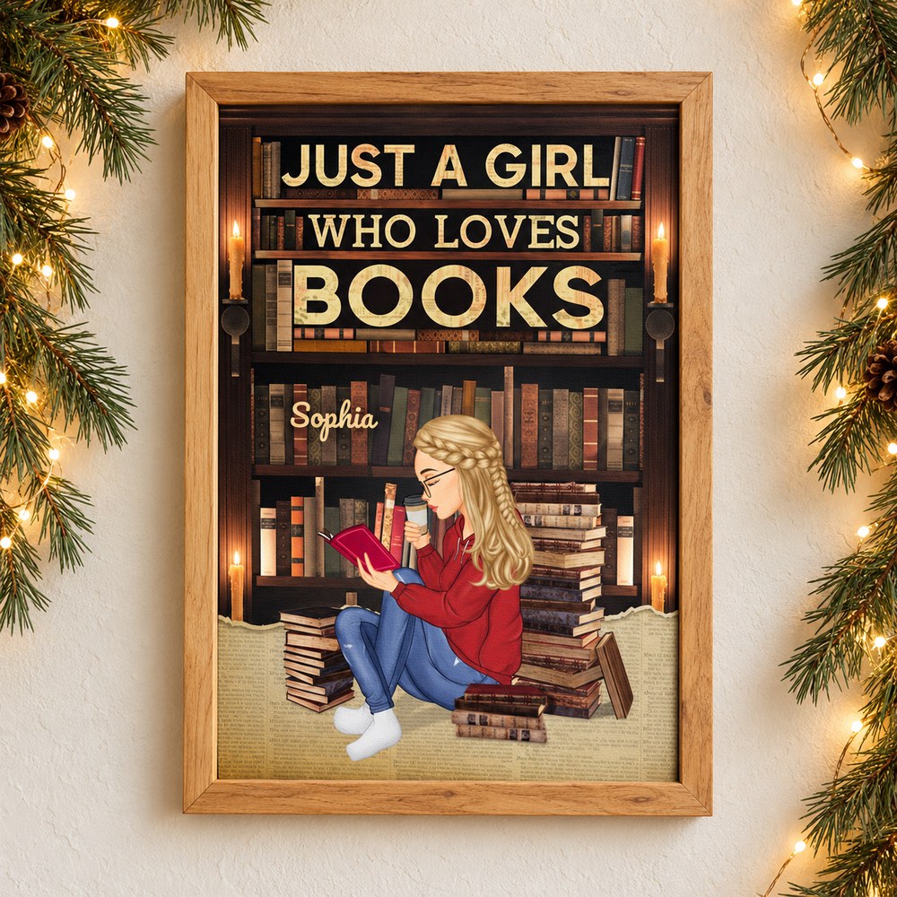 Personalized Just A Girl Who Loves Books framed canvas print hanging on wall with holiday garland