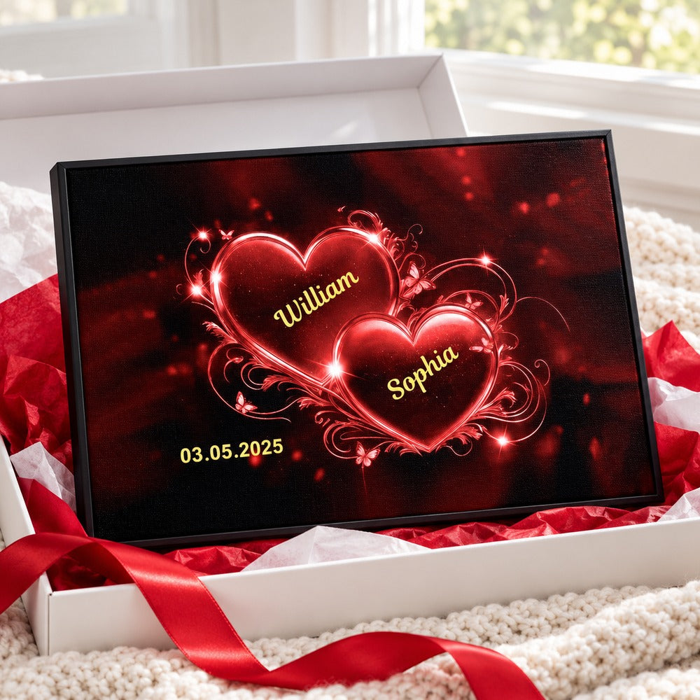 Personalized couple heart canvas print presented with a ribboned gift box and tissue paper