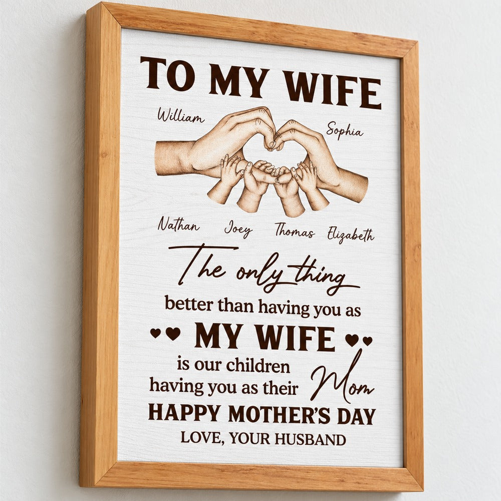 Close-up detail of the wood frame corner and textured canvas print showing the sketched family hands