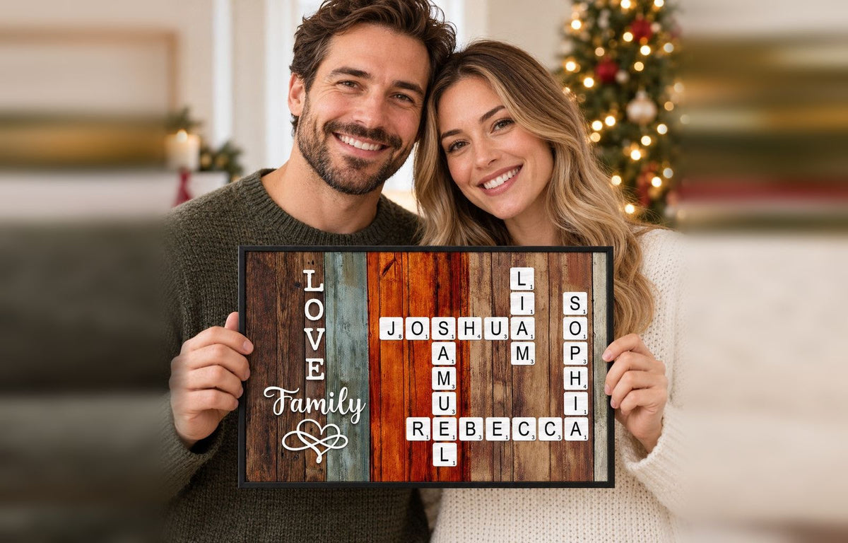 Couple holding a personalized family crossword canvas with their family names in front of a Christmas tree