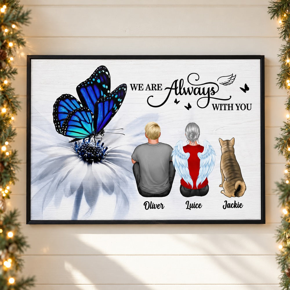 Personalized butterfly memorial canvas print hanging on wall with holiday garland