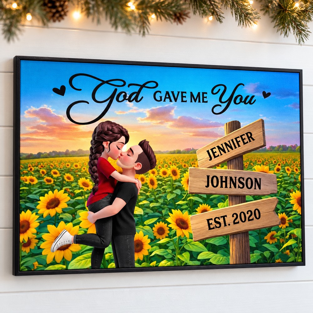 Personalized couple sunflower field canvas print hanging on a wall with holiday garland and fairy lights