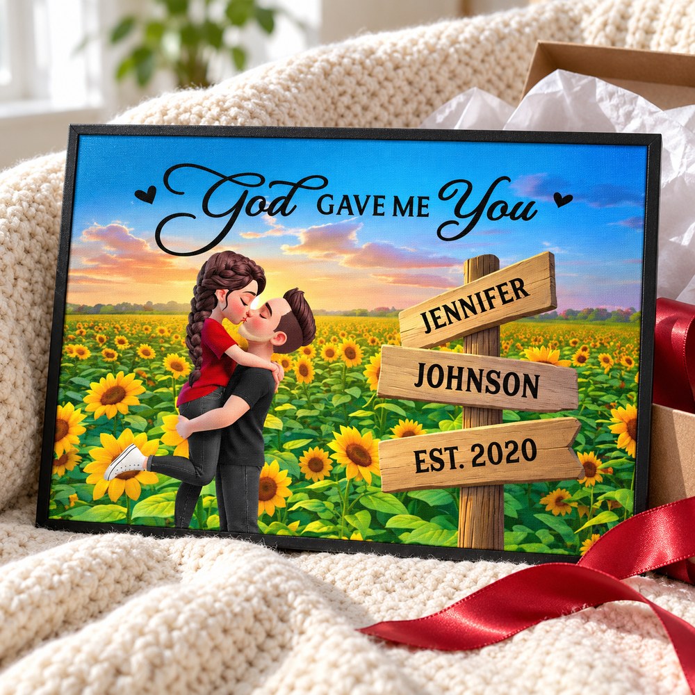 Personalized couple sunflower canvas print next to a holiday gift box with red ribbon