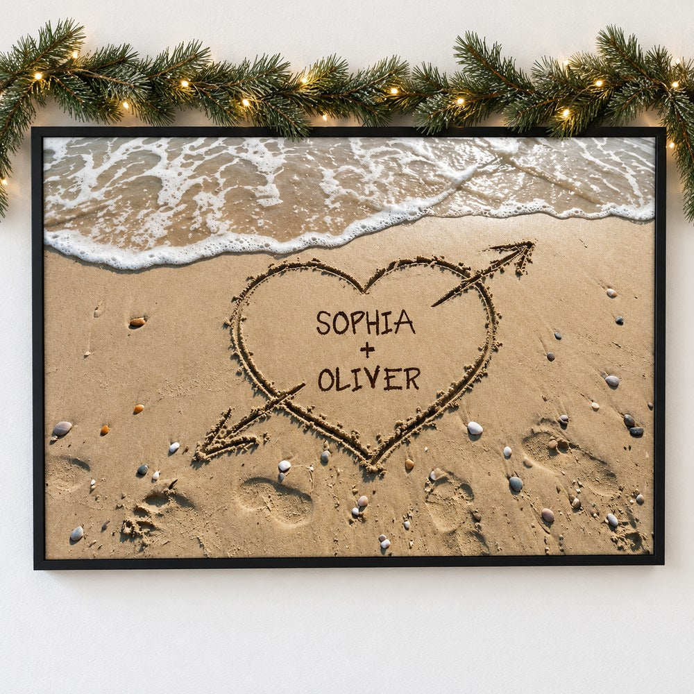 Personalized couple names heart in sand framed canvas print on wall with holiday garland
