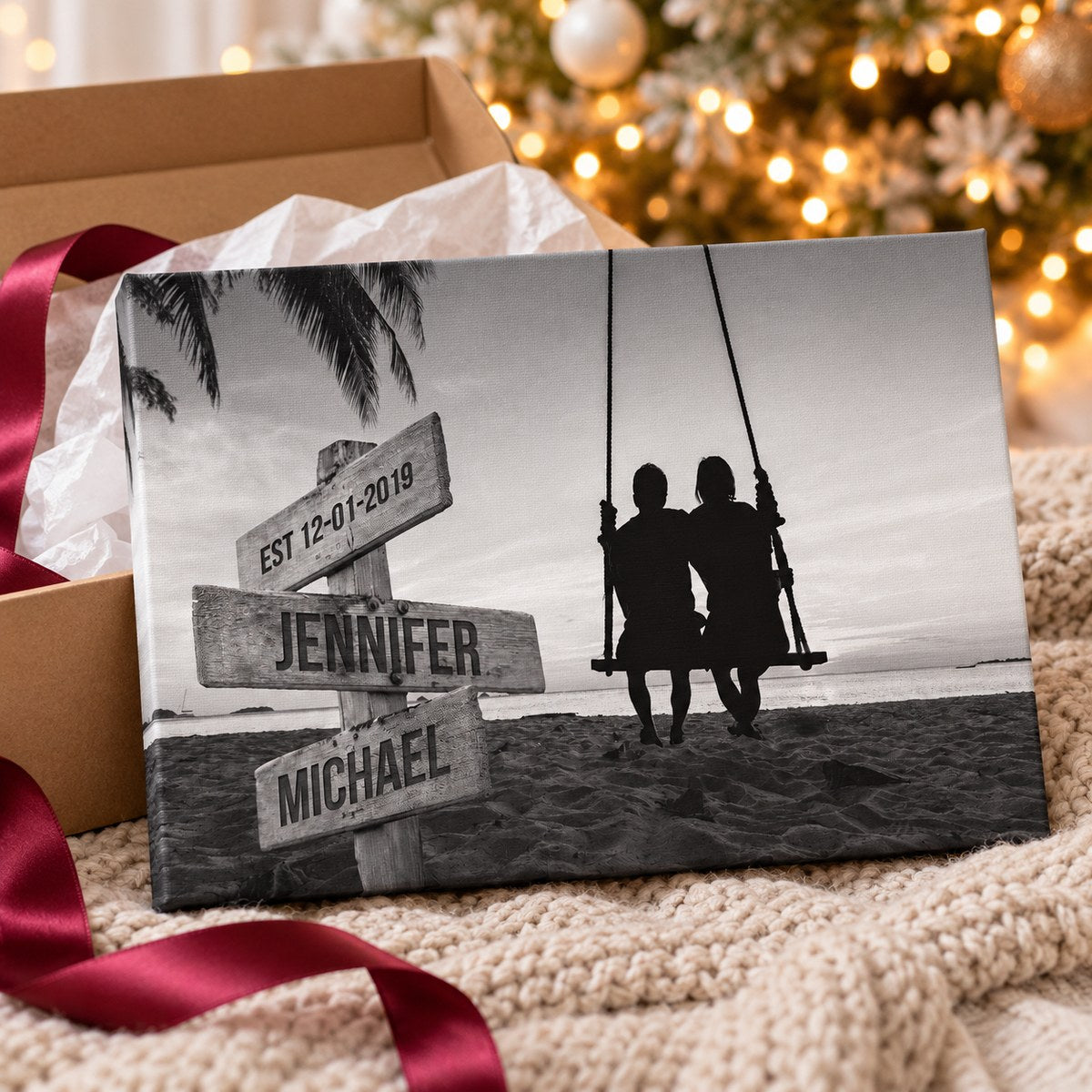 Personalized couple swing canvas presented with a ribboned holiday gift box