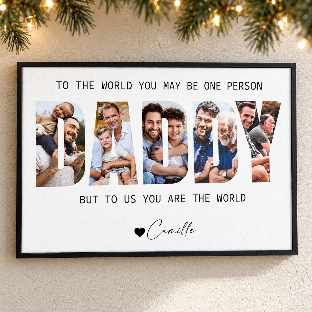 Custom Daddy photo collage canvas print hanging on a wall with soft holiday greenery and lights