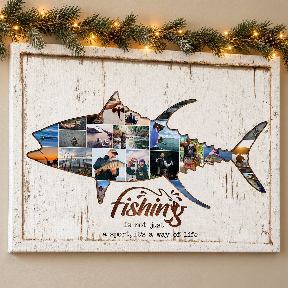 Custom photo fishing canvas print hanging on a wall with Christmas pine garland and fairy lights
