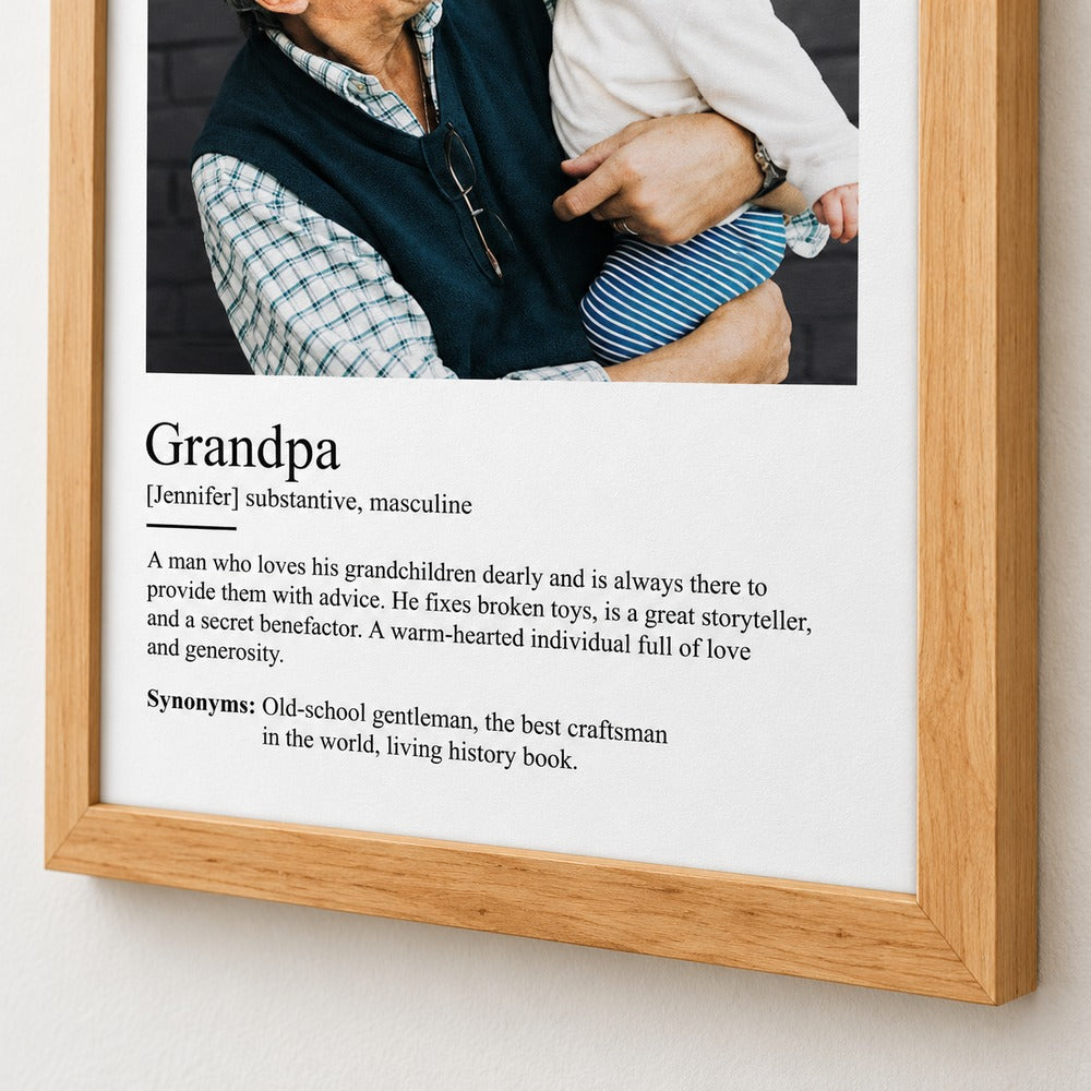 Close-up detail of the custom Grandpa definition text and natural wood frame