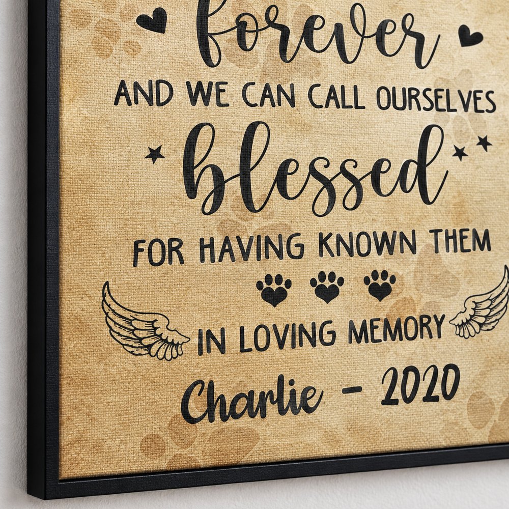 Close up detail of canvas texture and In Loving Memory Charlie 2020 print with paw prints and angel wings