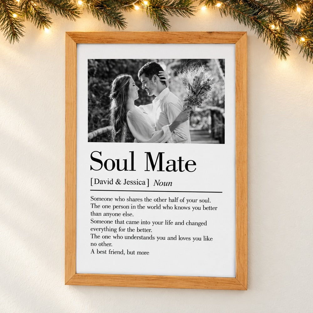Custom Soul Mate couple photo framed canvas print on a wall with soft holiday greenery and fairy lights