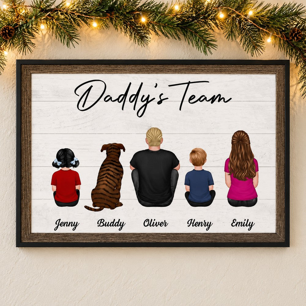 Daddy's Team personalized family canvas on a wall with holiday pine garland and warm fairy lights
