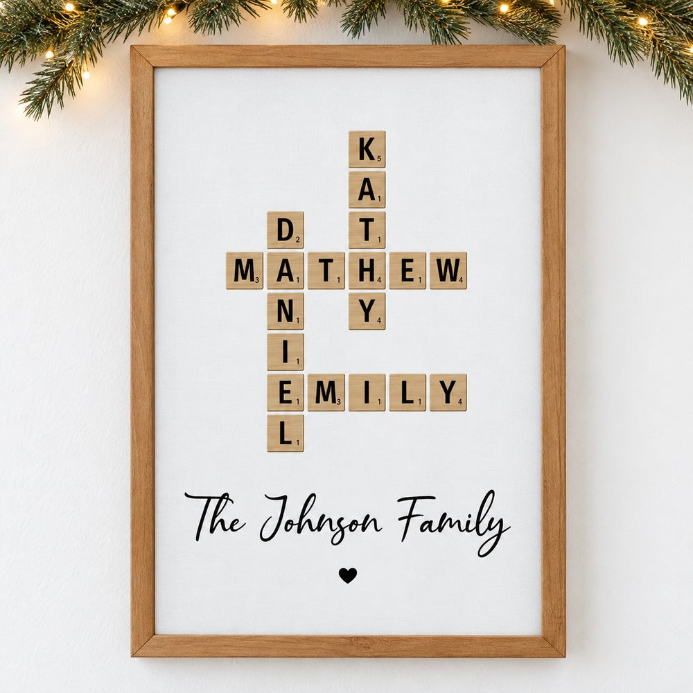 Family Crossword Art personalized framed canvas print hanging on wall with holiday garland