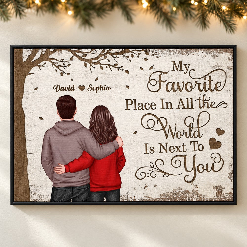 Personalized couple canvas wall art hanging on a wall with holiday garland and fairy lights