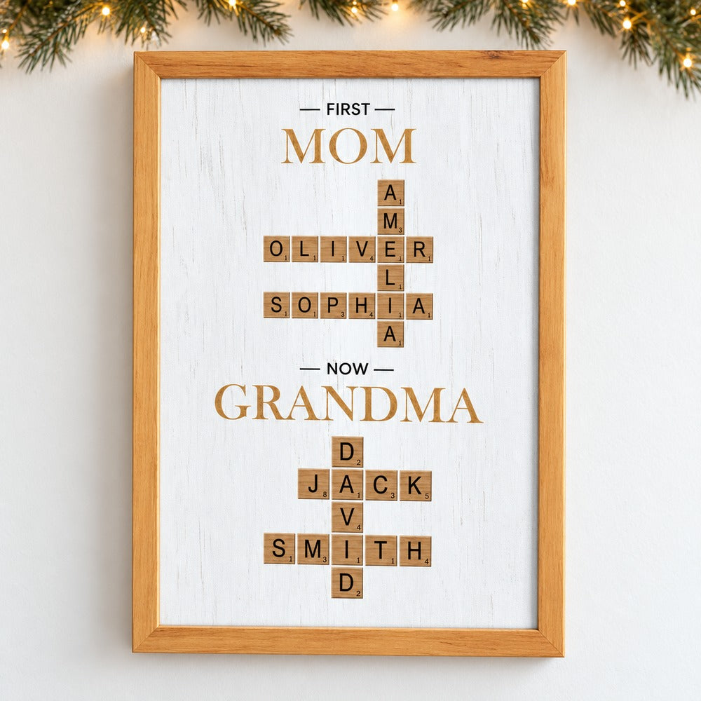 Personalized First Mom Now Grandma crossword canvas hanging on wall with holiday garland