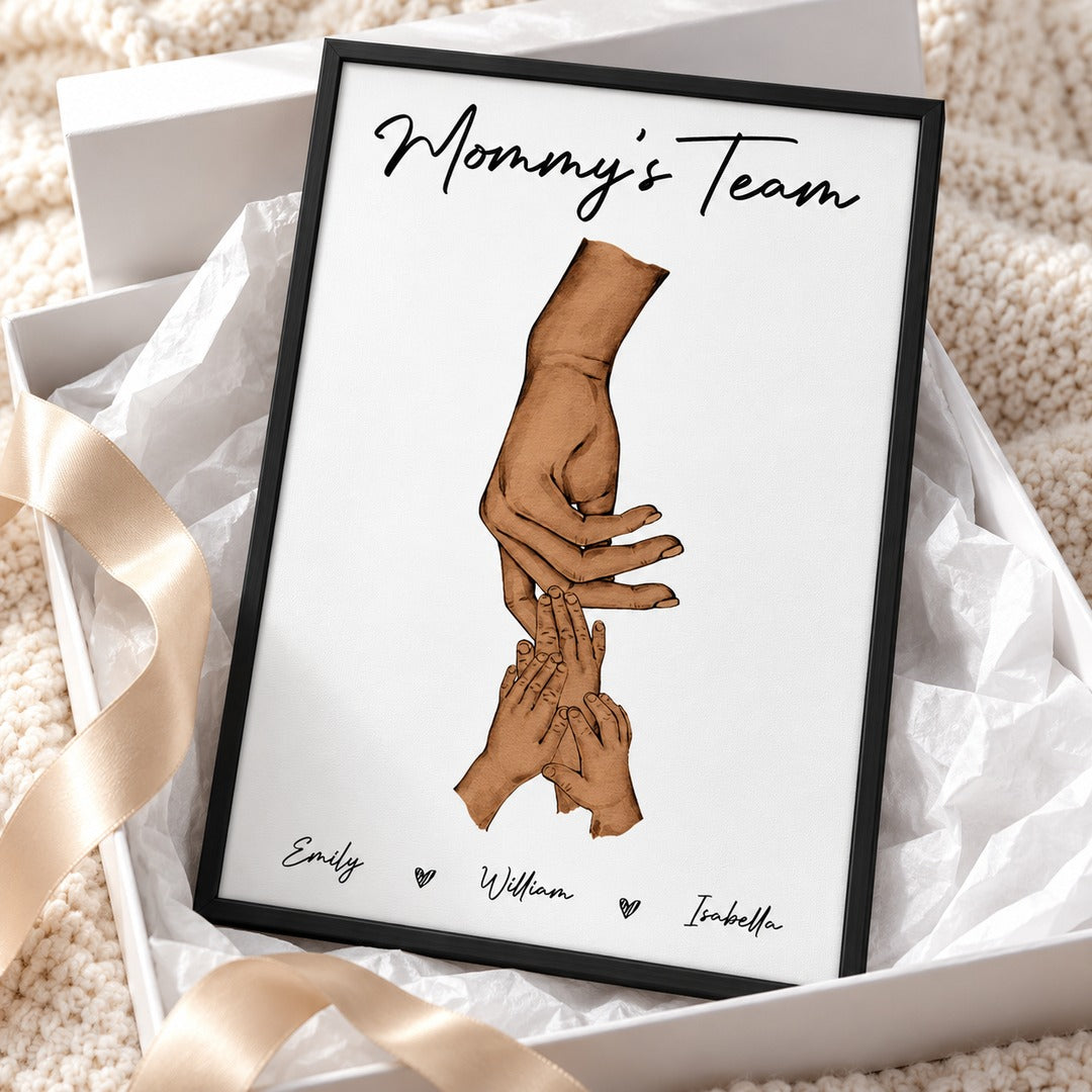 Personalized Mommy's Team framed print presented with a ribboned gift box for Mom