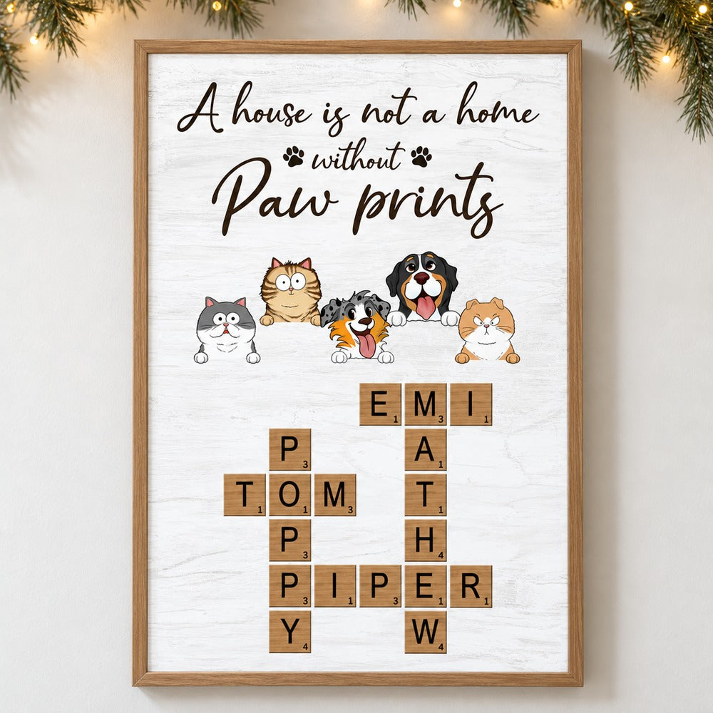 Personalized peeking dog cat crossword canvas print hanging on a wall with pine garland