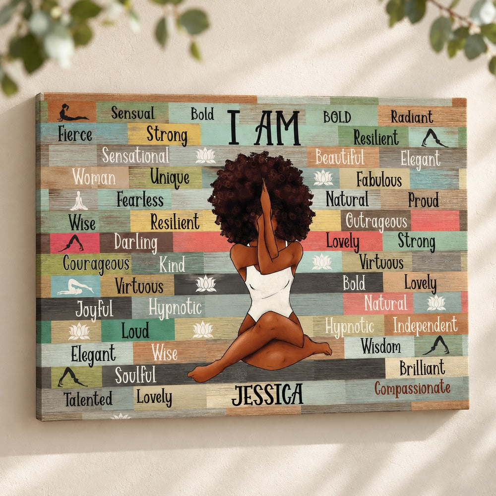 Personalized Black Woman Yoga Pose canvas wall art hanging on a bright cream wall with soft greenery