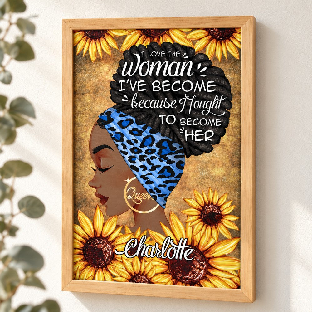 Personalized Black woman sunflower canvas print hanging on a warm plaster wall with soft greenery