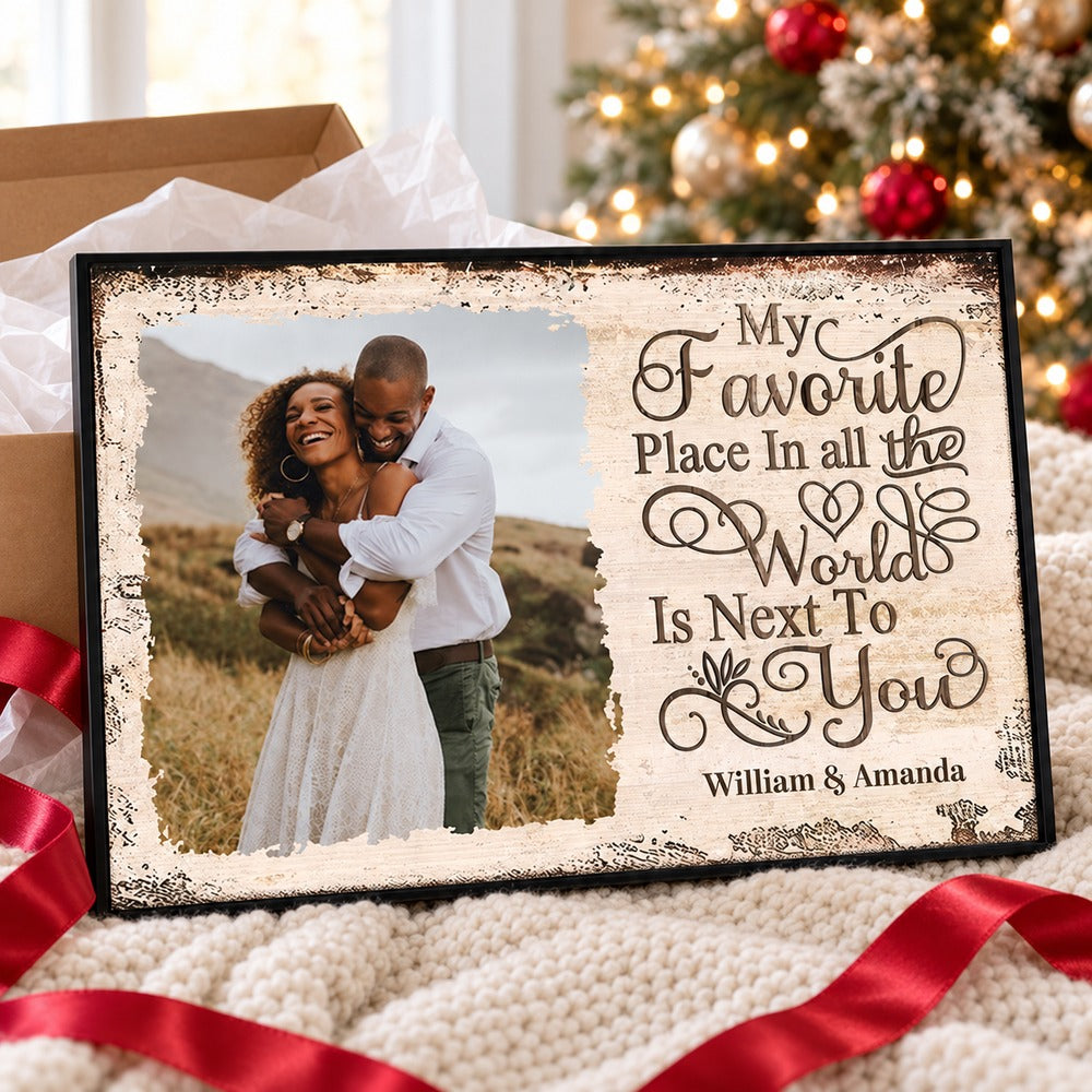 Custom couple canvas print next to a festive gift box with ribbon for Christmas or anniversary