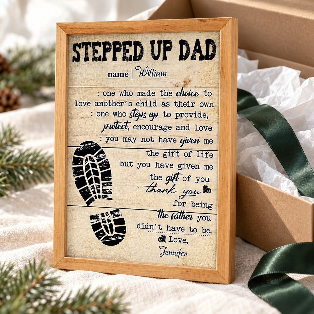 Stepped Up Dad personalized framed canvas print next to a holiday gift box with ribbon