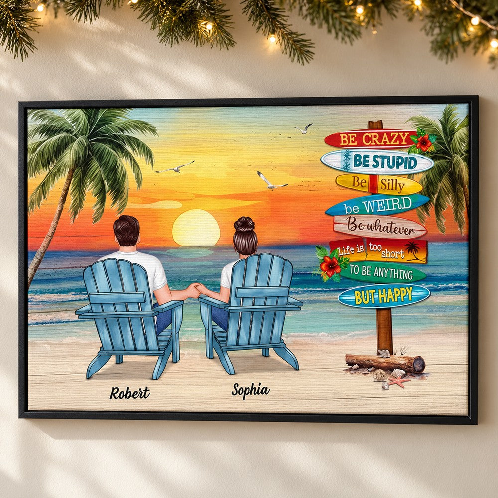 Personalized couple beach sunset canvas print hanging on wall with holiday garland and fairy lights