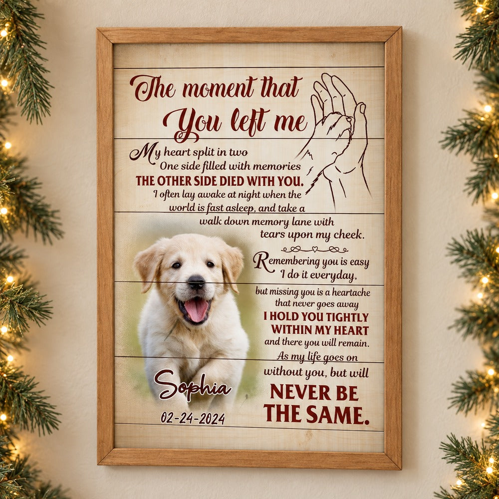 Custom photo pet memorial framed canvas hanging on a wall with soft holiday greenery and fairy lights