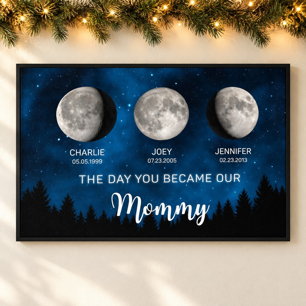 Personalized moon phase canvas print for Mommy hanging on wall with holiday pine garland