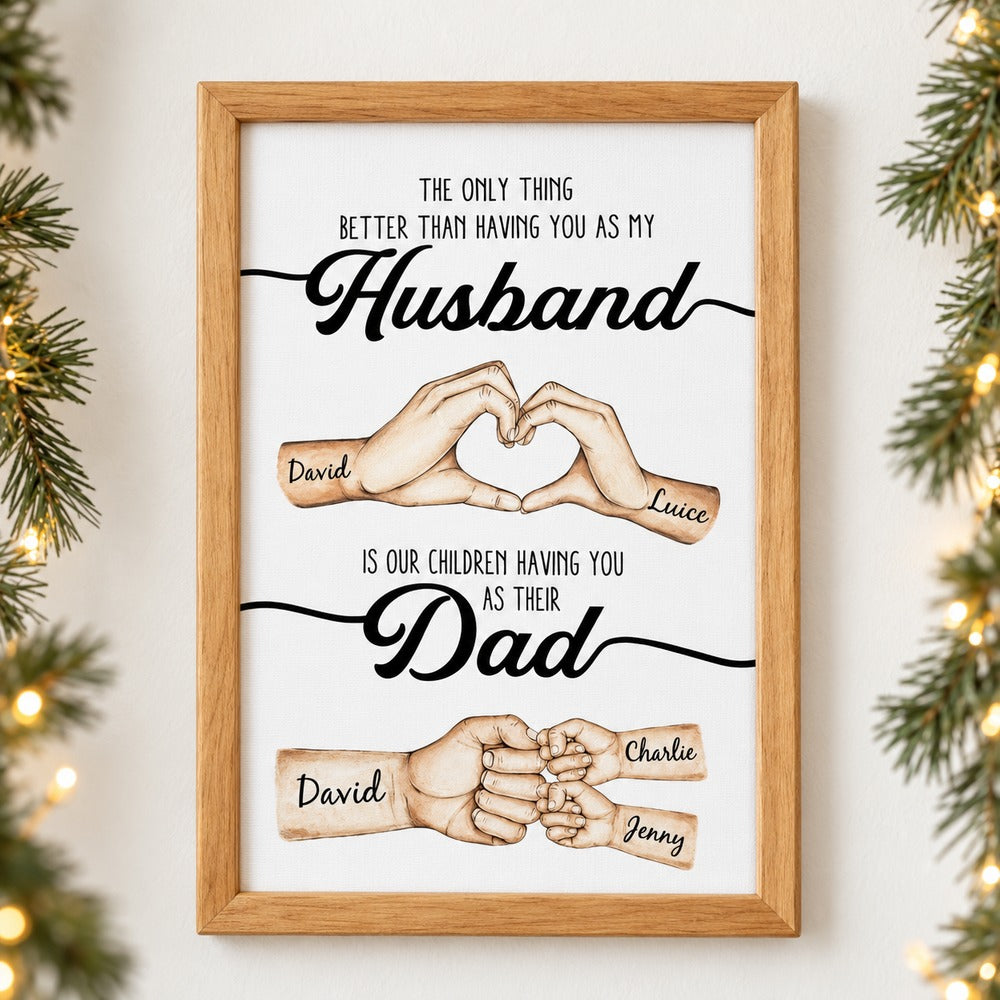 Personalized Husband and Dad hands framed canvas print hanging on a wall with holiday garland