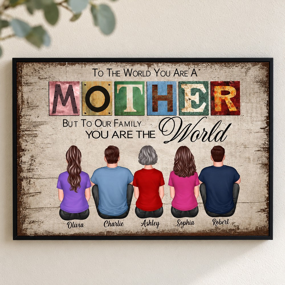 To The World You Are A Mother personalized framed canvas displayed on a neutral home wall