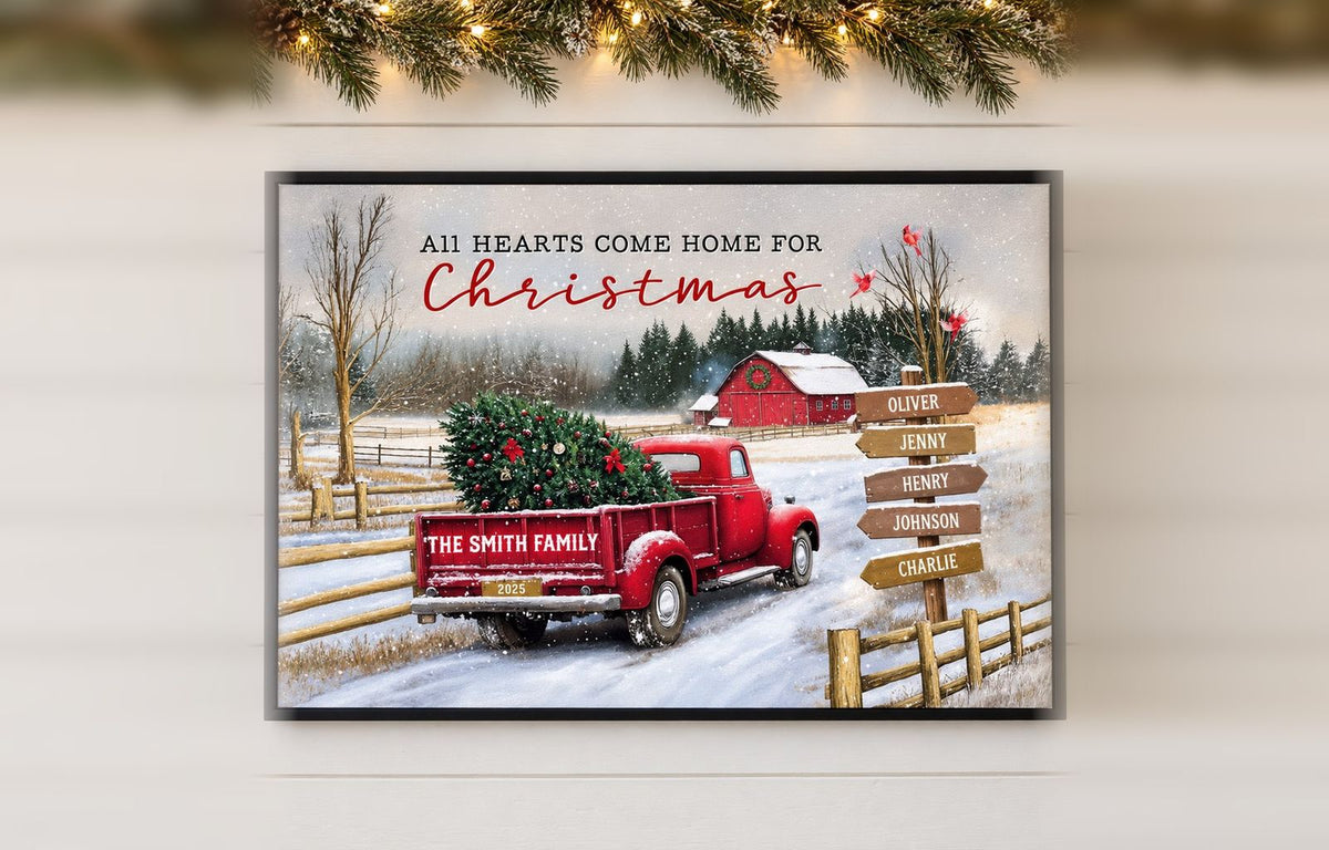 Personalized All Hearts Come Home for Christmas canvas with a red truck and family names, hanging under a Christmas garland